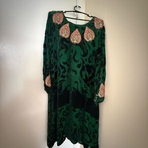 Elegant Green and Black Dress with Intricate Detailing